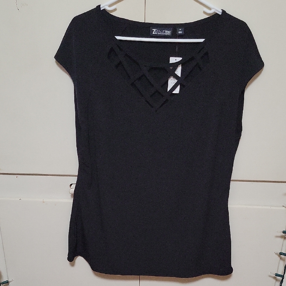 Elegant Black Blouse with Geometric Neckline